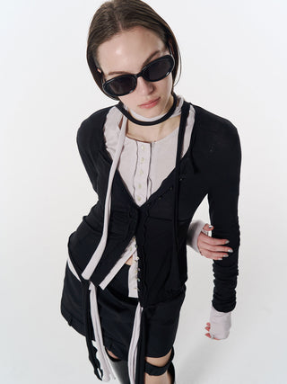 LOW WEST CUTTING MINI SKIRT